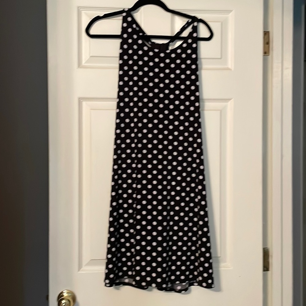 Black and white summery dress. Very flattering. Light weight. Not sheer!!
